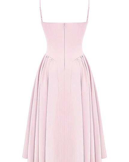 Light pink corset midi dress back view with thin straps, center zipper, and full pleated skirt