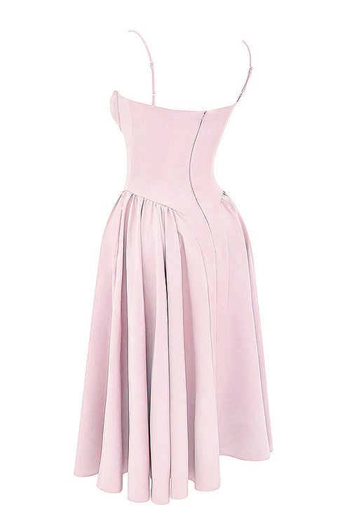 Light pink corset midi dress angled back view showing fitted bodice seams and flared pleated skirt