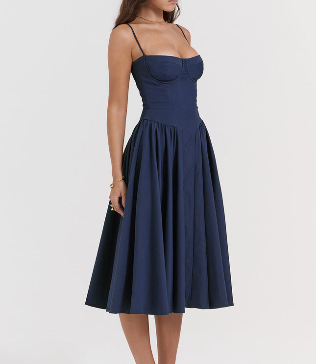 Navy corset midi dress three-quarter view highlighting structured bust cups and gathered skirt