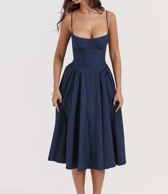 Navy corset midi dress front view with head turned, featuring underwire cups and full midi skirt