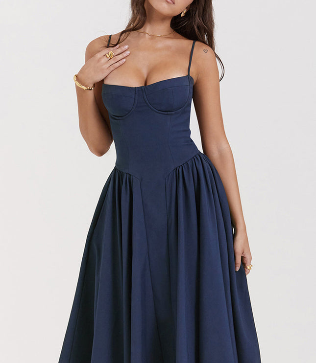 Navy corset midi dress close-up showing underwire bust detail, thin straps, and structured bodice seams