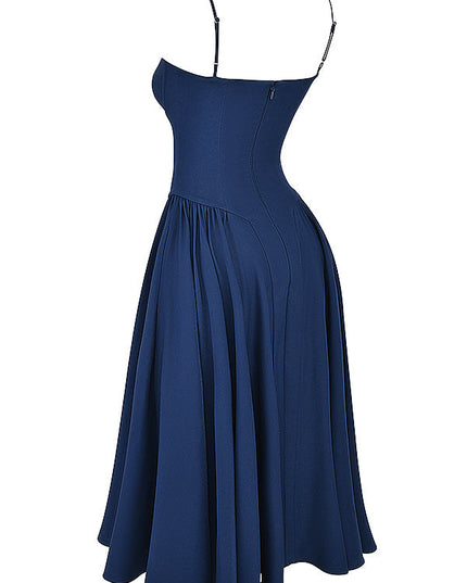 Navy corset midi dress angled side view with fitted bodice seams and flared midi skirt