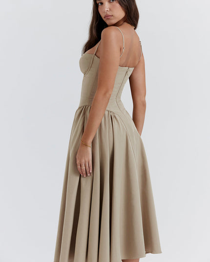 Beige corset midi dress side back view showing zipper closure and fitted corset bodice