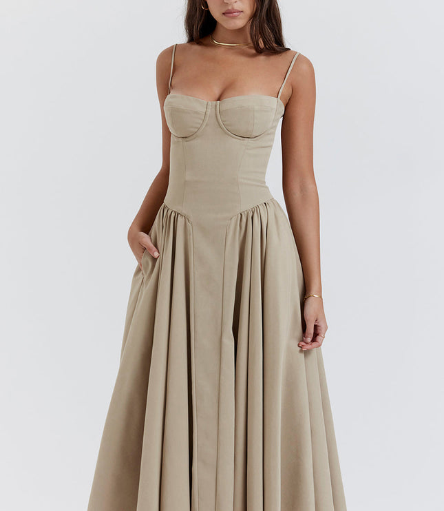 Beige corset midi dress three quarter view with structured bodice seams and gathered skirt