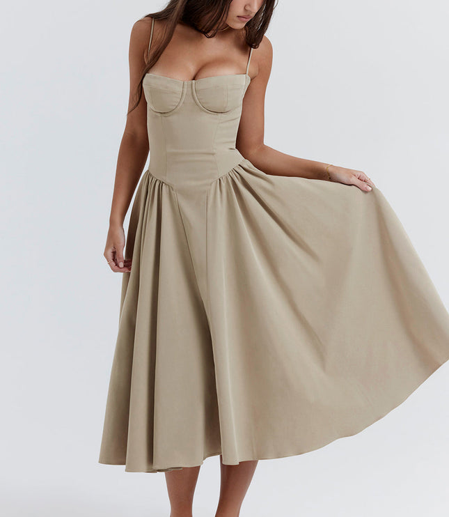 Beige corset midi dress action shot with flared skirt held out to show volume and drape