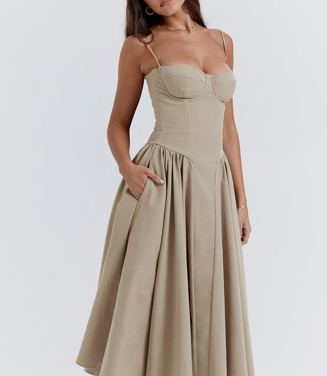 Beige corset midi dress angled view showing bodice structure, thin straps, and flowing skirt