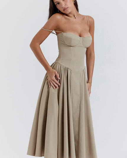Taupe corset midi dress with underwire bust cups, thin straps, and full pleated skirt, three-quarter view