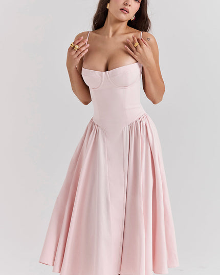 Close front view of blush pink corset midi dress showing sweetheart bustier cups and thin straps