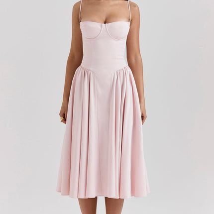Blush pink corset midi dress front view with sweetheart bustier, thin straps, and full pleated skirt