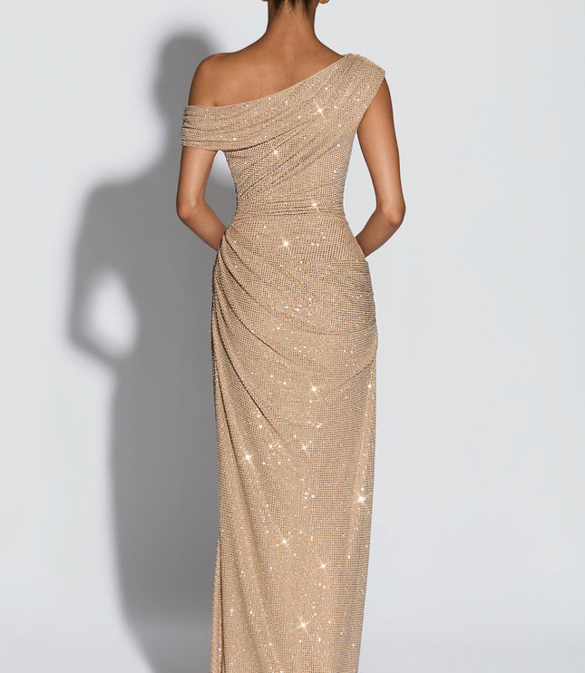 Back view of champagne off-shoulder sequin maxi dress with asymmetrical neckline and ruching