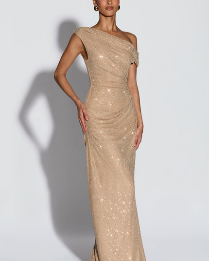 Three-quarter view of champagne off-shoulder sequin maxi dress with fitted waist and draped ruching