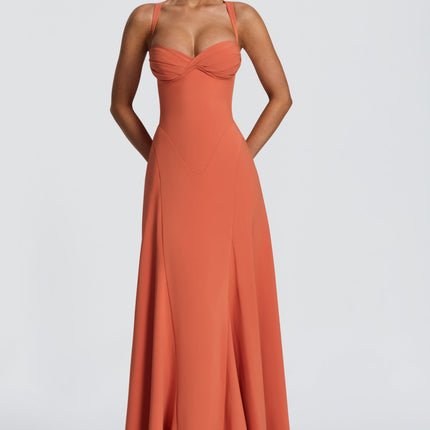 Coral pleated maxi dress with twisted sweetheart bodice and wide straps, front view