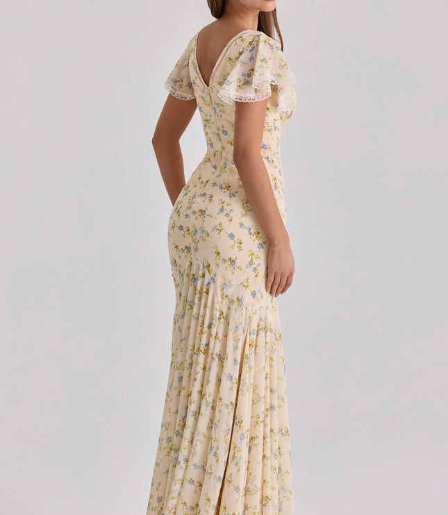 Cream floral lace-trim maxi dress back angle showing flutter sleeves and fitted waist seam