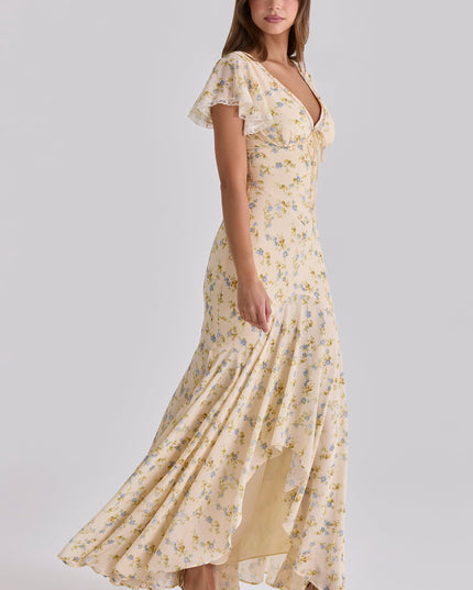 Cream floral V-neck maxi dress with lace trim flutter sleeves, flowing skirt shown in side view