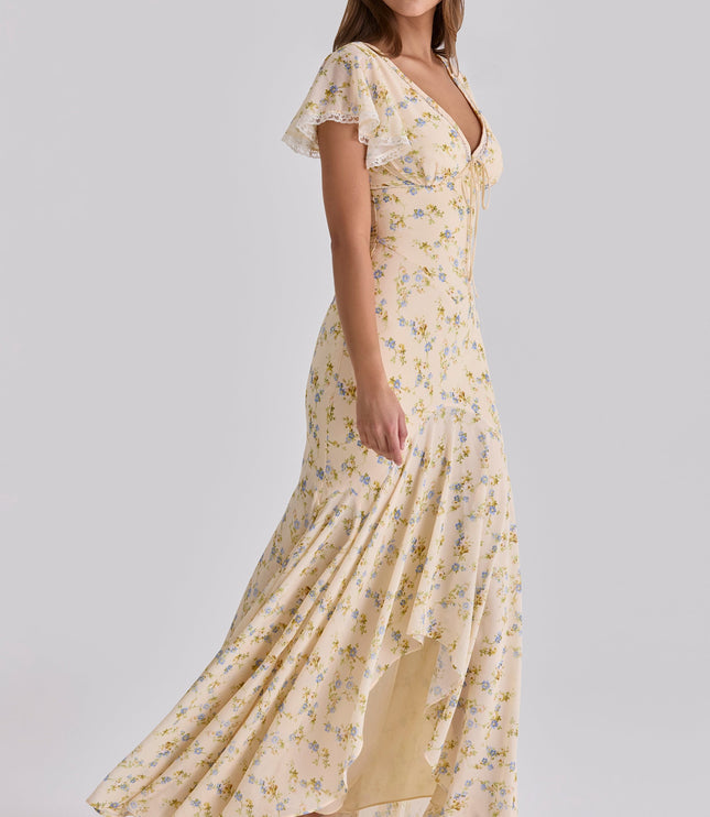 Cream floral V-neck maxi dress with lace trim flutter sleeves, flowing skirt shown in side view