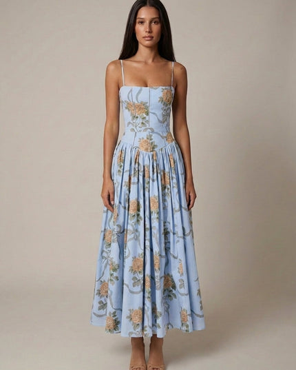 Light blue floral corset midi dress with spaghetti straps and pleated skirt, front view