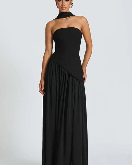 Front view of black halter maxi dress with fitted bodice and floor-length flowing skirt