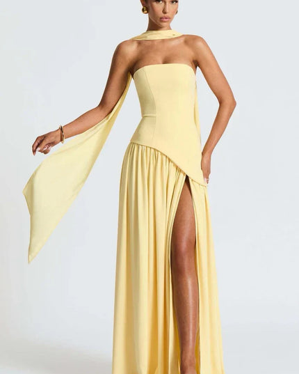 Pale yellow halter maxi dress with scarf tie, strapless bodice, and thigh slit front view