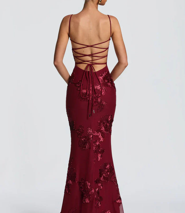 Burgundy lace maxi dress back view with strappy open back and tie detail