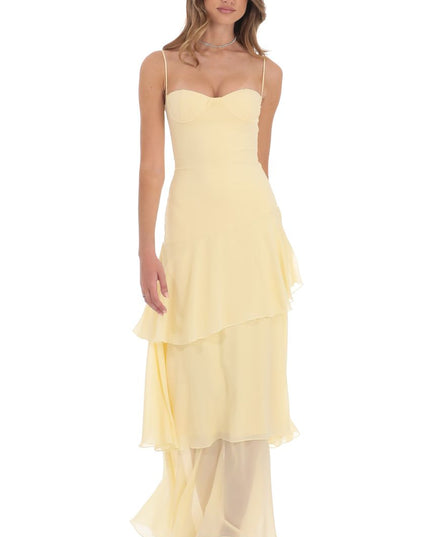 Pale yellow corset ruffled maxi dress with spaghetti straps and tiered skirt, front view