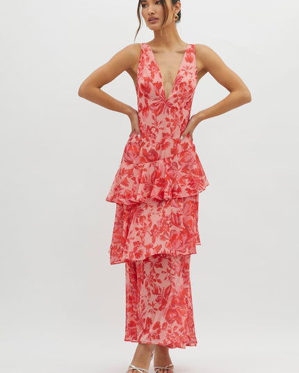 Pink floral ruffled maxi dress front view with plunging neckline and layered skirt