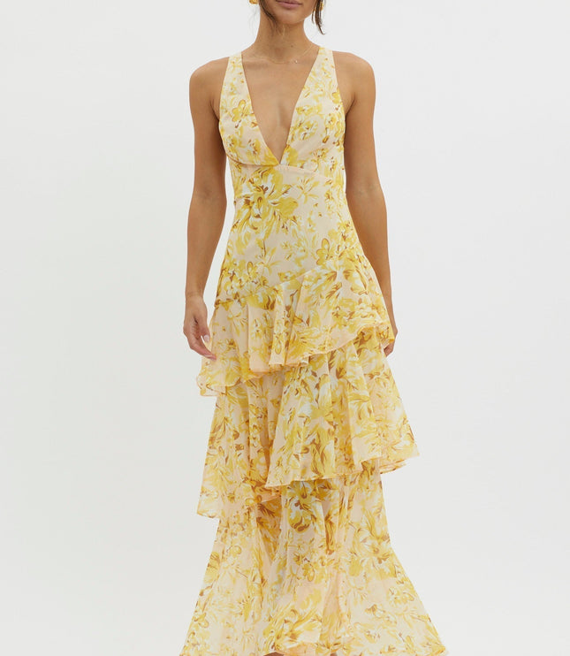 Yellow floral ruffled maxi dress front view with plunging neckline and layered skirt
