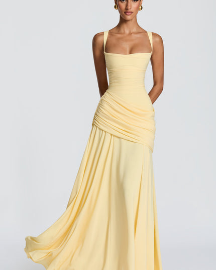 Pale yellow square neck satin maxi dress with ruched drape and flowing skirt, front view