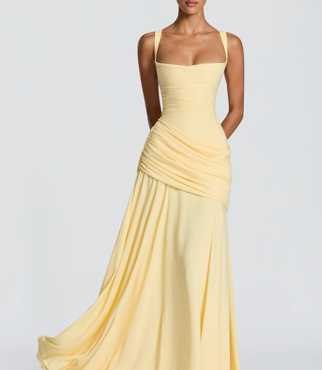 Pale yellow square neck satin maxi dress with ruched drape and flowing skirt, front view