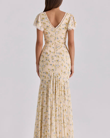 Cream floral lace v-neck maxi dress from back angle, showing fitted waist and flowing skirt
