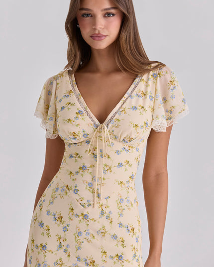 Cream floral lace v-neck maxi dress close-up with sheer flutter sleeves and tie-front neckline