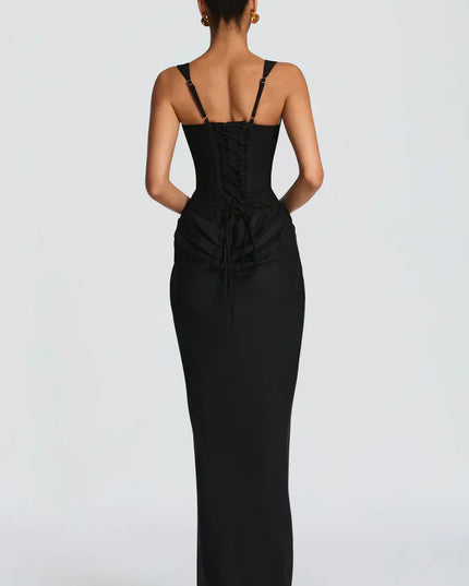Back view of black square neck corset maxi dress with lace-up corset back and floor-length skirt