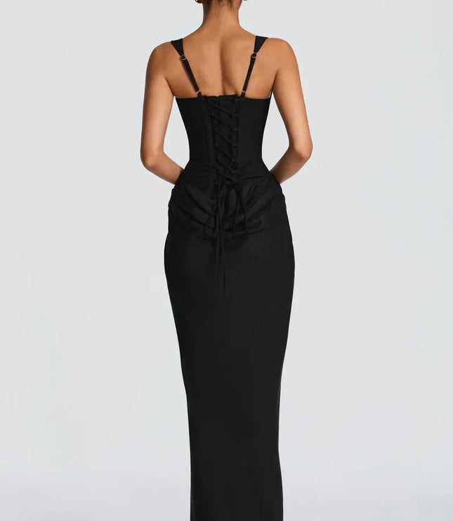 Back view of black square neck corset maxi dress with lace-up corset back and floor-length skirt