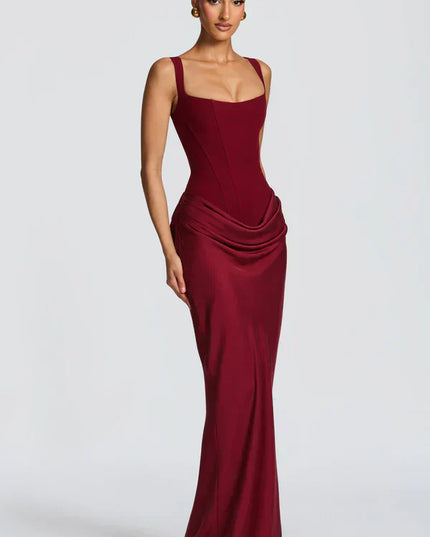 Burgundy square neck corset maxi dress shown at a slight angle with fitted skirt