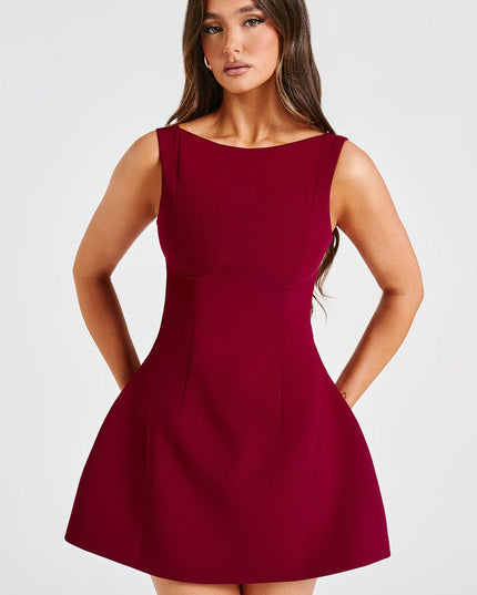Detailed front view of the women's red high neck bubble mini dress, highlighting the silhouette and fabric texture.