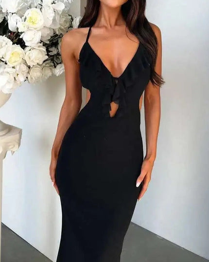 Front view of a black halter ruffle cut out backless maxi dress, with a deep V-neck and subtle side cutouts.