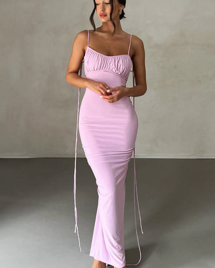 Front view of a women's light purple pleated plunge neck maxi dress, showing the full length and fitted style