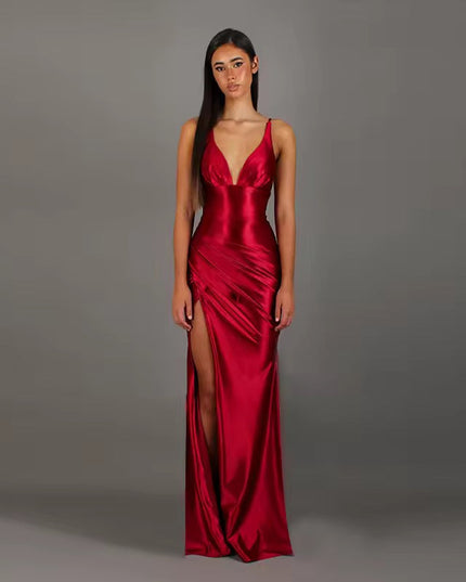 Front view of a red formal backless V-neck slit maxi dress, showcasing the elegant silhouette and rich color.