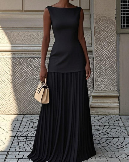 Stylish black sleeveless boat neck maxi dress with a flowing pleated skirt, for formal wear.