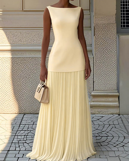 Pale yellow sleeveless boat neck maxi dress for women, showcasing a beautifully pleated full skirt.