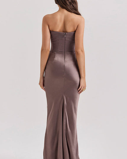 Back view of the taupe off-shoulder bustier maxi dress, showing the hidden zipper closure and floor-length design.