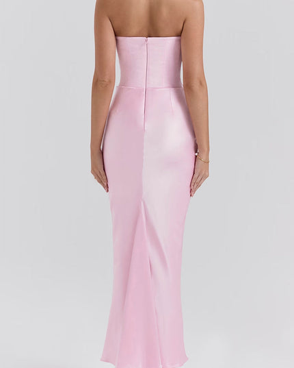 Back view of the women's pink off-shoulder bustier maxi dress, showcasing the smooth fabric and back seam.