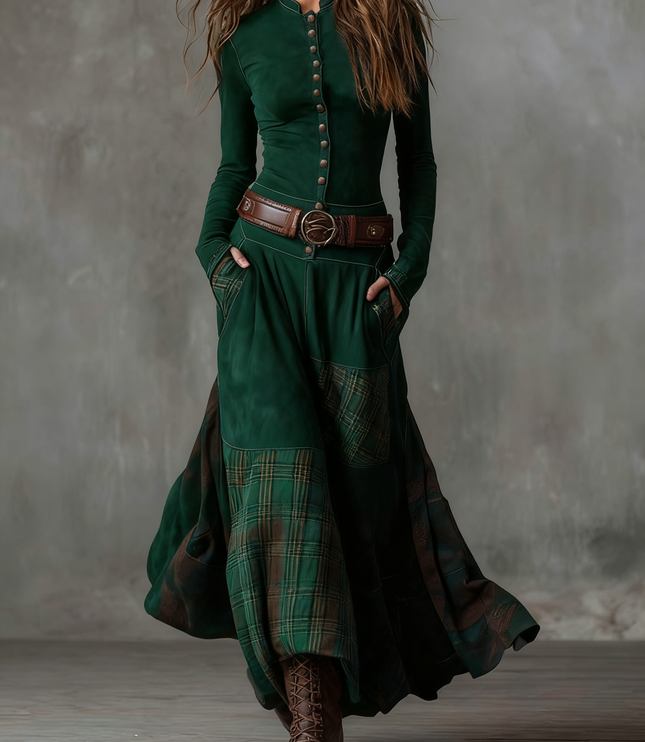 Women's long sleeve button down maxi dress in deep green, with a plaid panel skirt and brown belt detail.