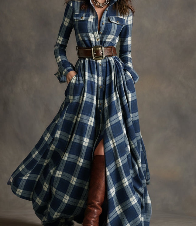 Women's navy blue and white plaid long sleeve button down maxi dress with a brown belt, open front slit, and brown boots.