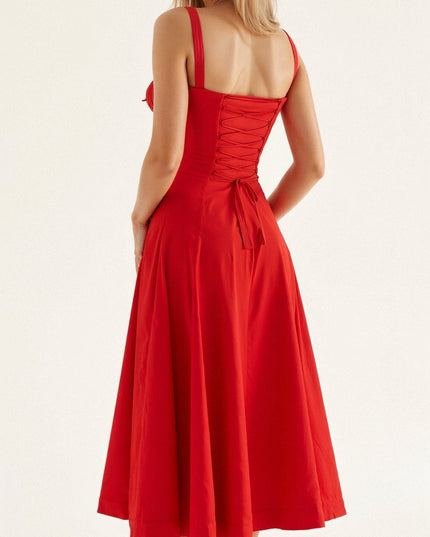 Back view of a red summer midi dress featuring a lace-up corset back and an A-line skirt.