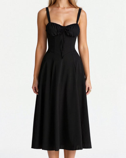 Front view of an all black corset bow front midi dress, featuring a silhouette.