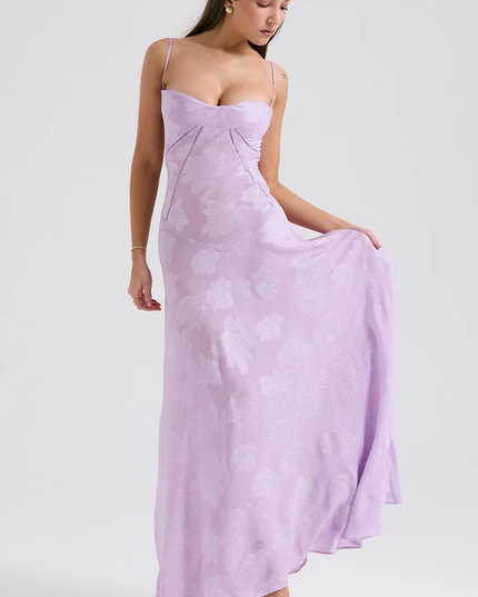 Women's floral corset maxi dress in delicate lavender, featuring a sweetheart neckline and subtle floral pattern.