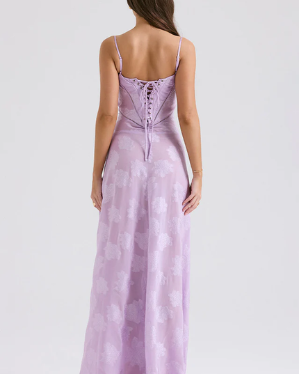 Rear view of women's lavender floral corset maxi dress, displaying the intricate lace-up back design.