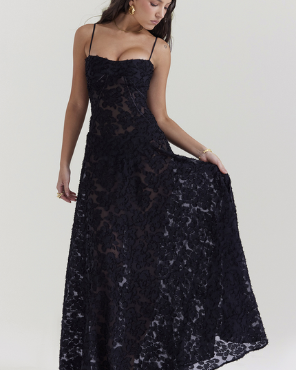 Women's black floral corset maxi dress with textured floral pattern, sweetheart neckline, and thin straps.
