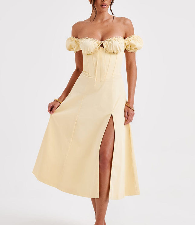Full view of a light yellow off-shoulder puff sleeve corset midi dress with a front split.