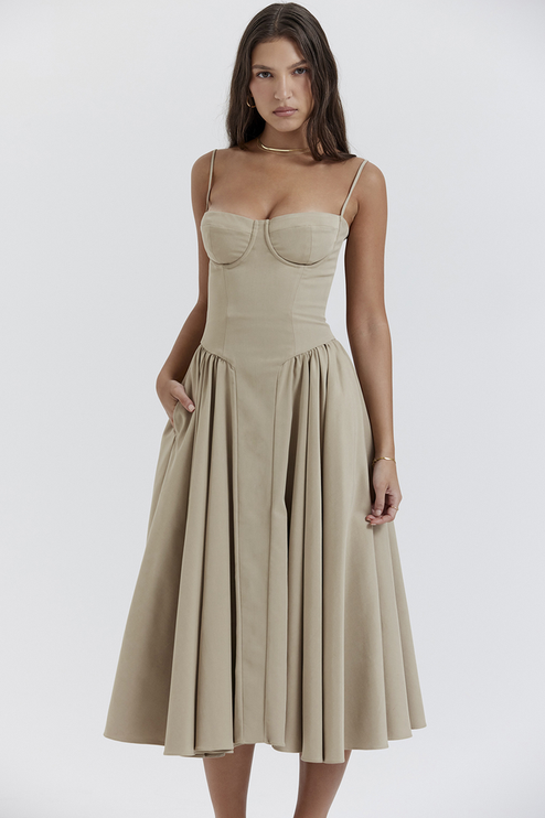 Women's light khaki sweetheart neck corset midi dress featuring a structured bodice and a voluminous skirt with pockets.